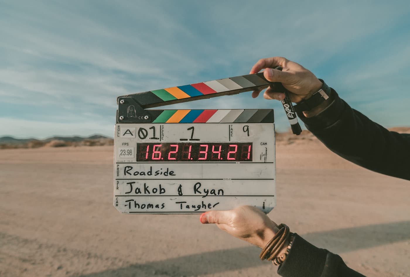 Film camera and production lighting on a movie set